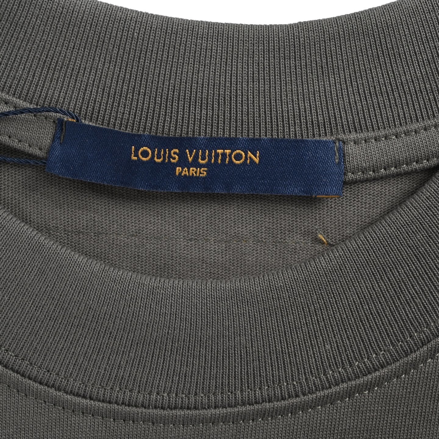 Green embroidered letter T-shirt