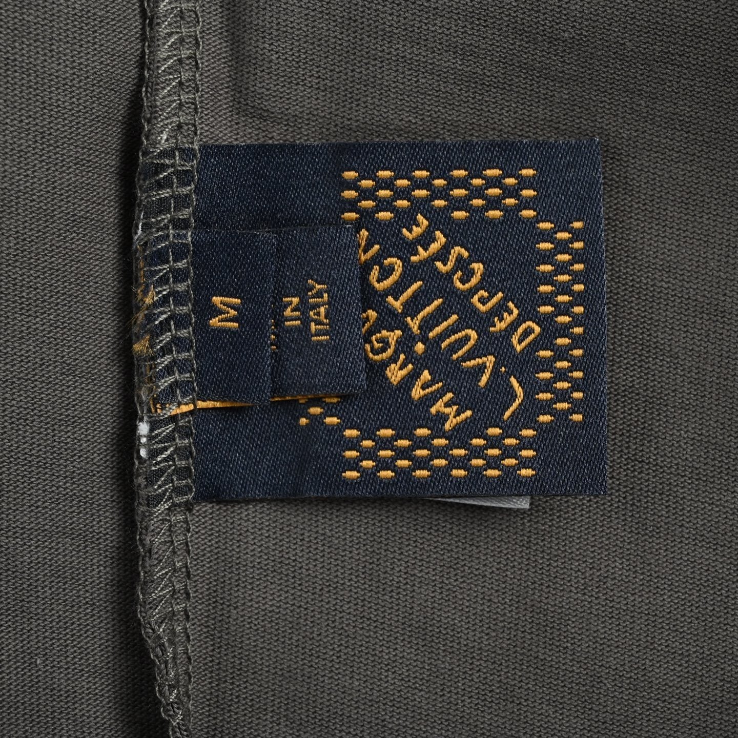 Green embroidered letter T-shirt