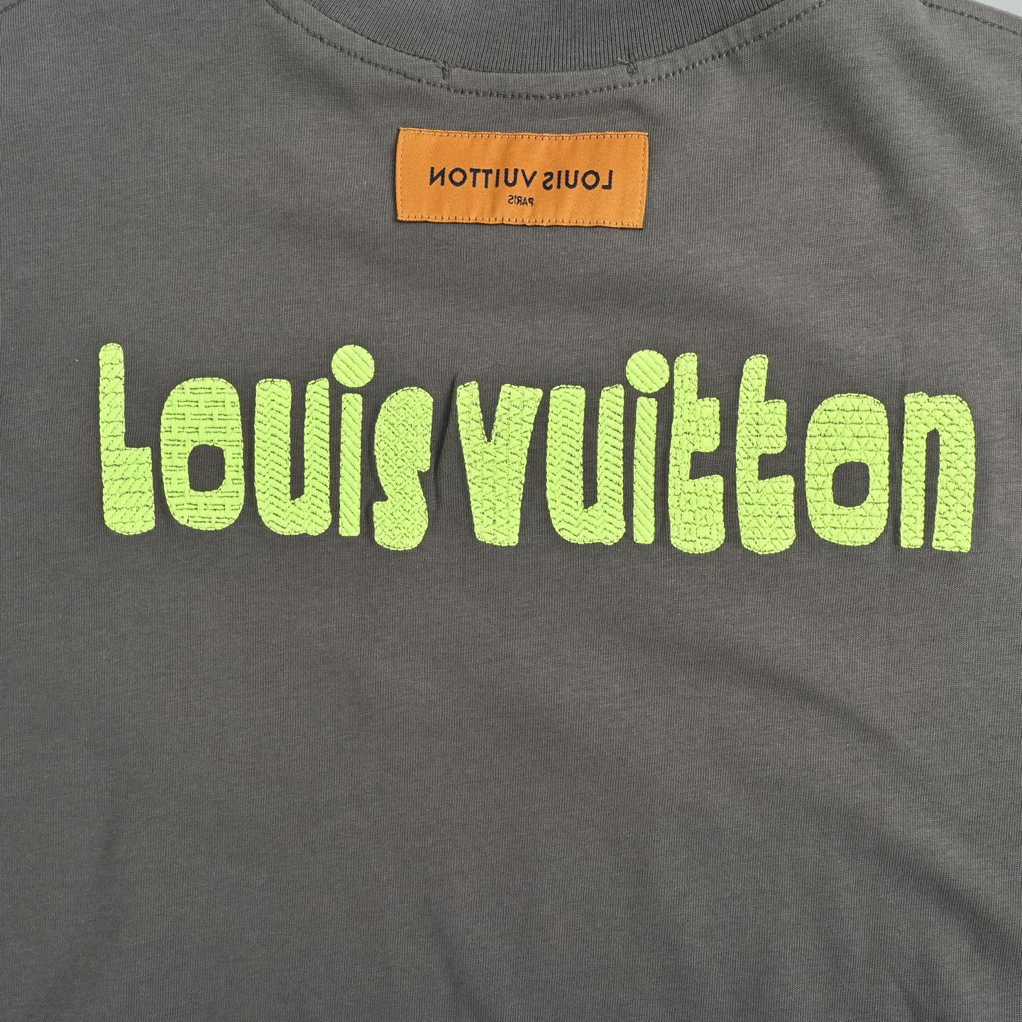 Green embroidered letter T-shirt